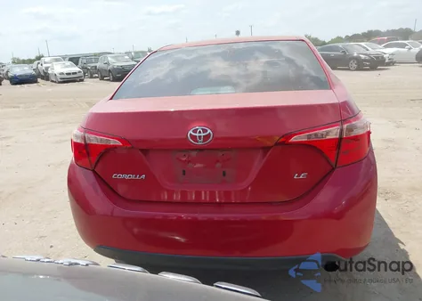 2017 Toyota Corolla Le z USA, uszkodzony, nr VIN 5YFBURHE9HP694884